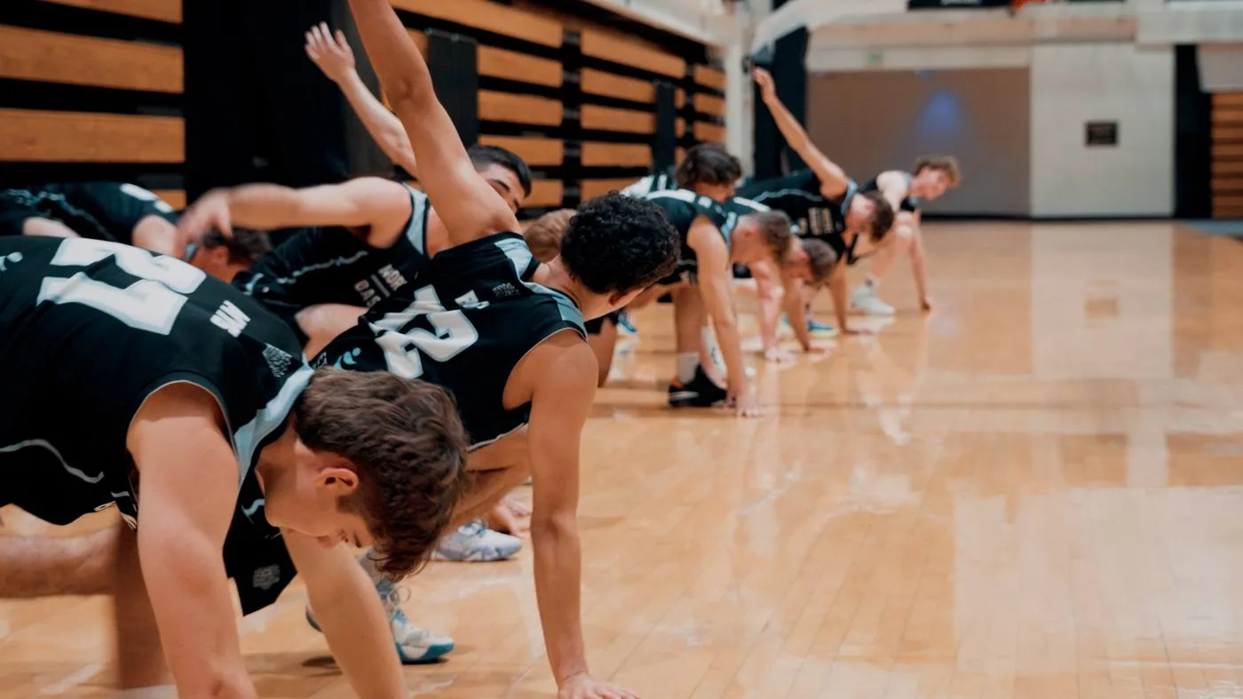 North Coast Basketball players in a line on the gym floor
